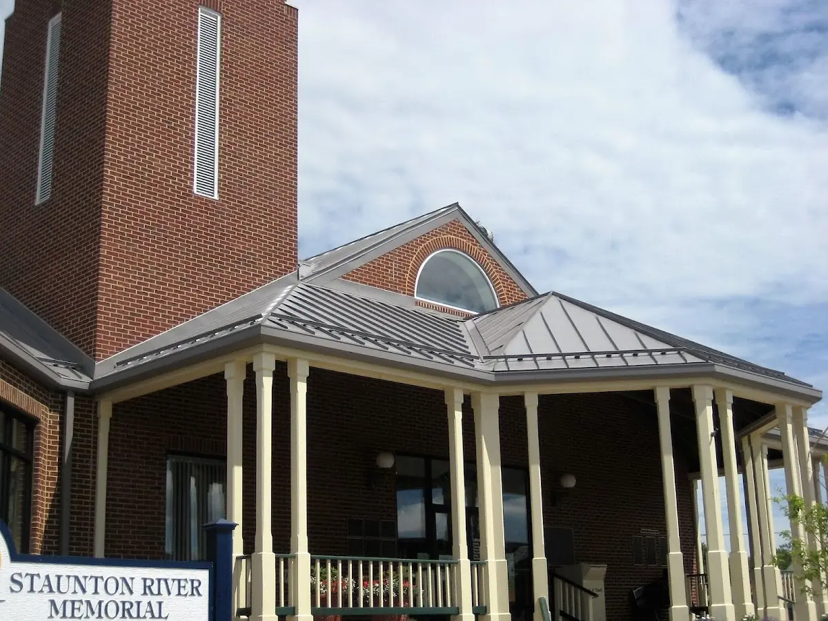 Skilled roofing craftsmen working on a residential roof in Bell-Greenway